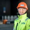 Glad kvinde på arbejde i Stena Recycling