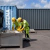 two men handling batterier