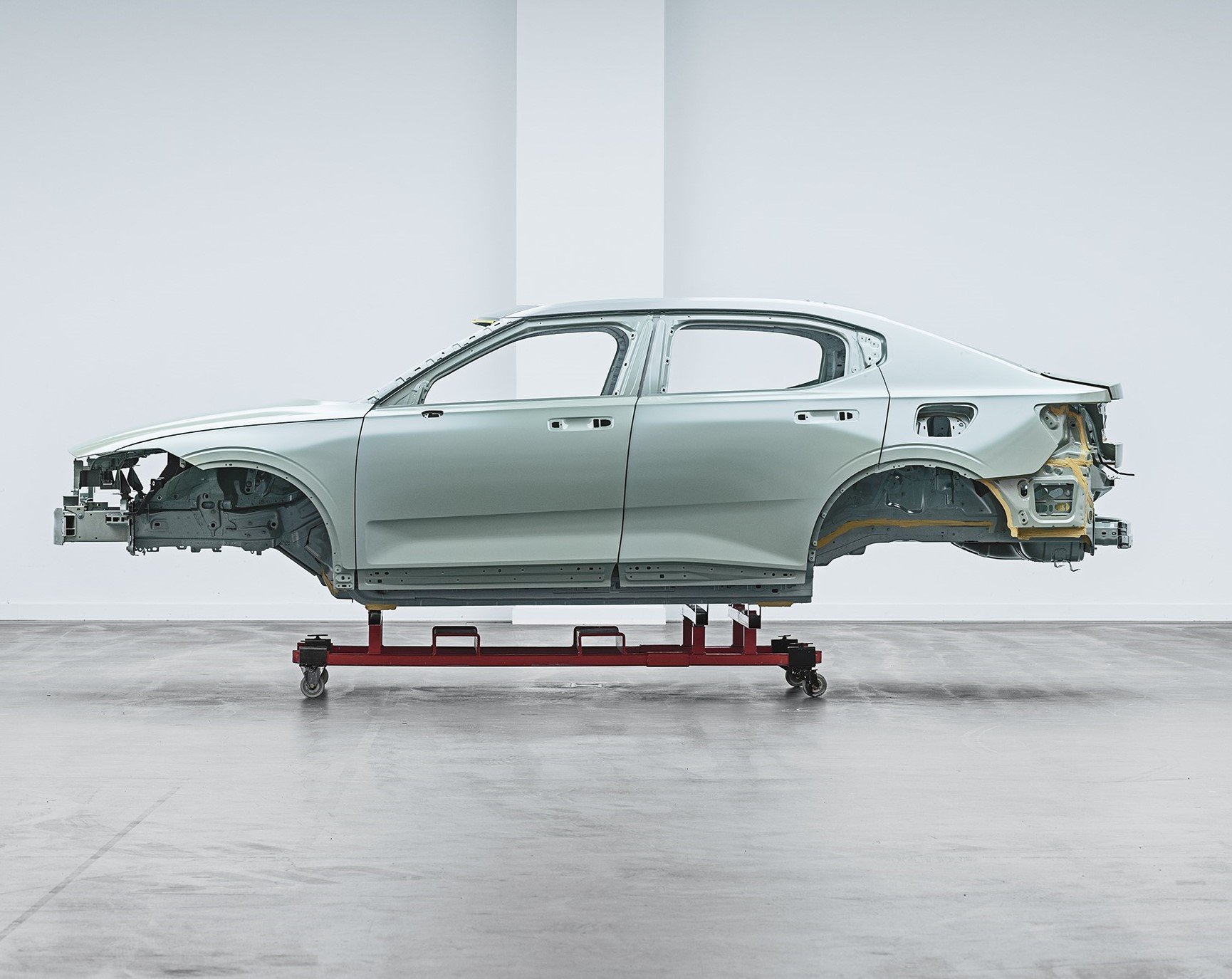 A car chassis in a factory.