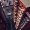 Bird’s eye view of a white Stena Recycling lorry collecting waste in a courtyard between tall residential buildings